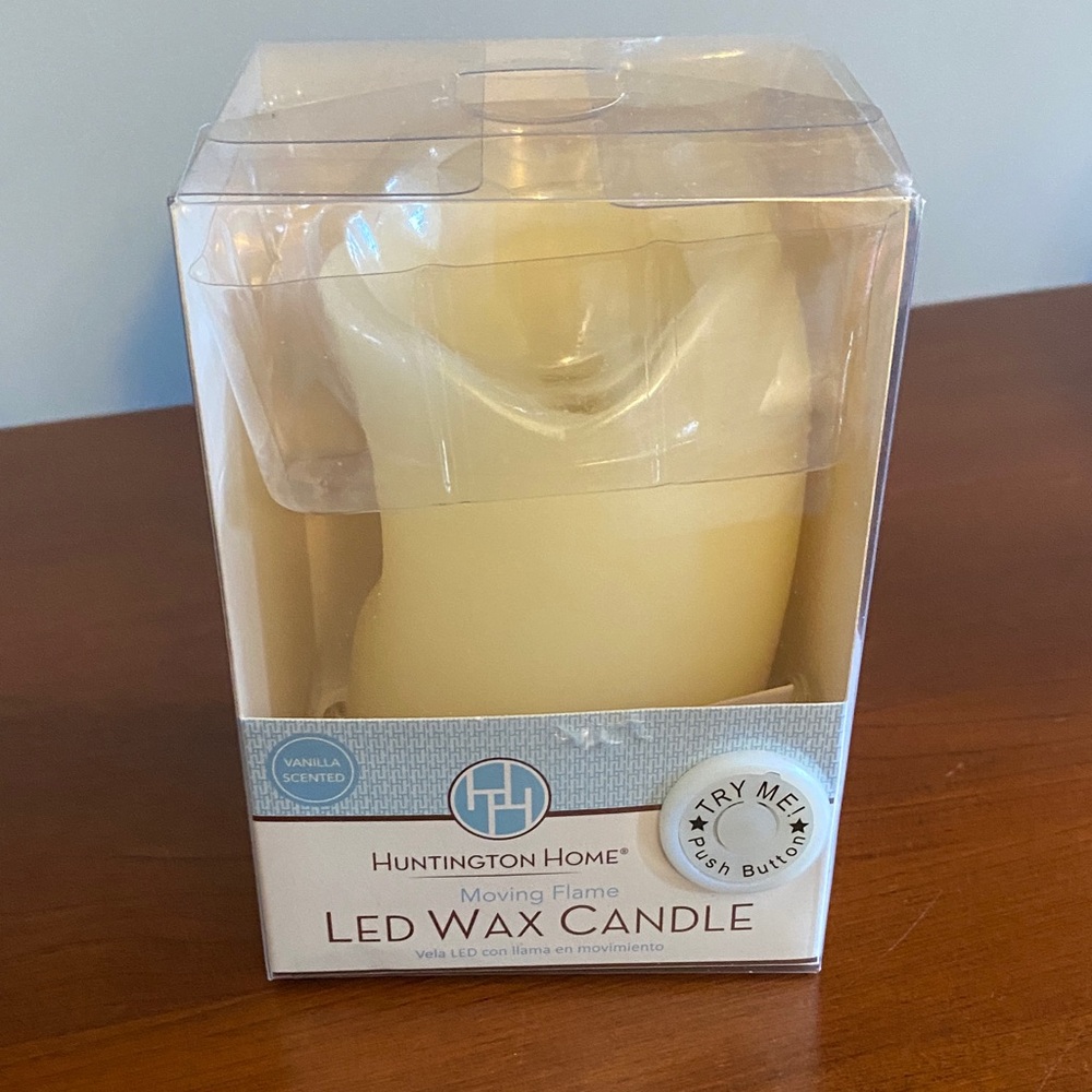 LED candle with moving flame. New in box
